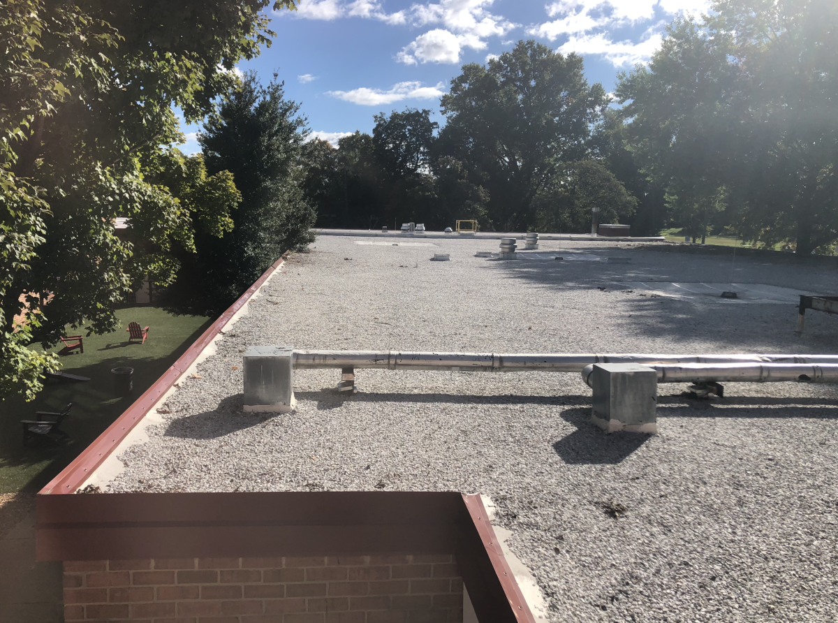 A section of the school roof above a segment of the blue hallway.